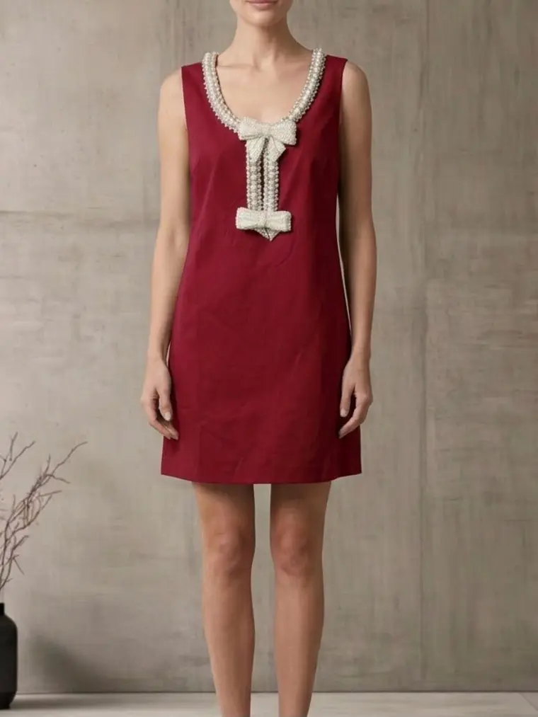 Vestido vino con perlas